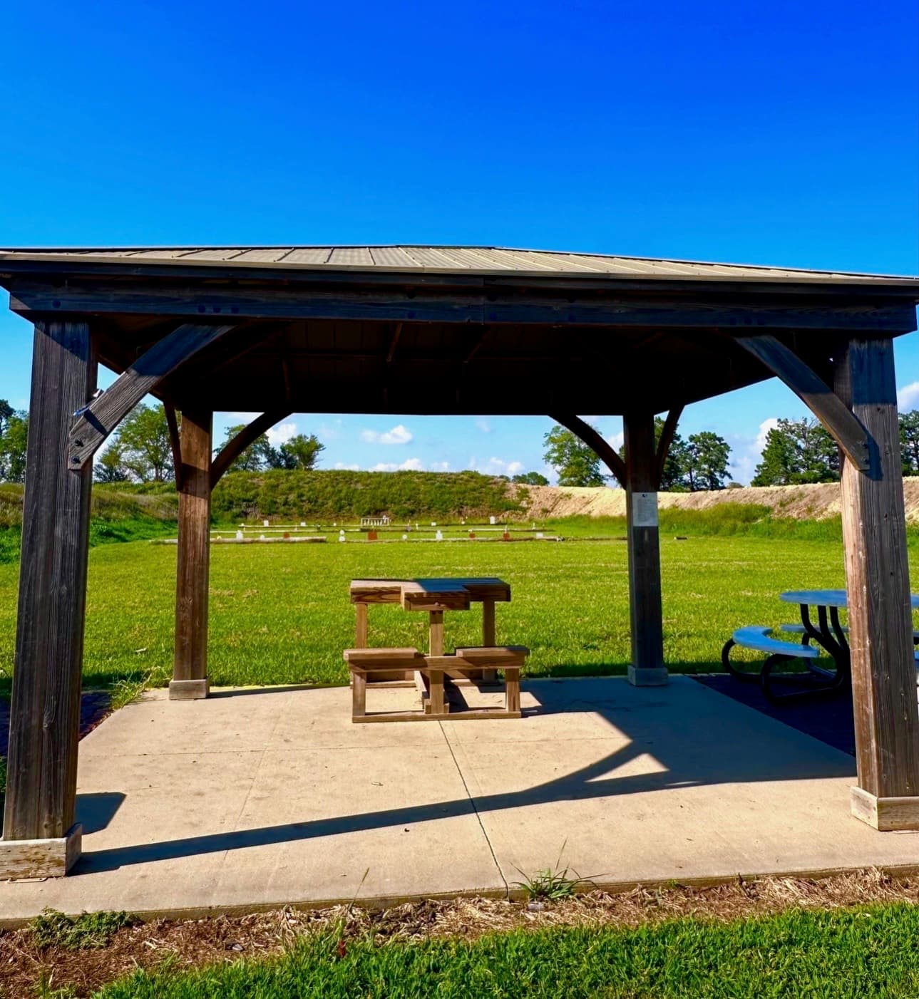 Covered shooting pavilion overlooking the range